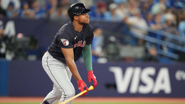 Aug 25, 2023; Toronto, Ontario, CAN; Cleveland Guardians designated hitter Oscar Gonzalez (39) hits a double against the Toronto Blue Jays during the sixth inning at Rogers Centre.